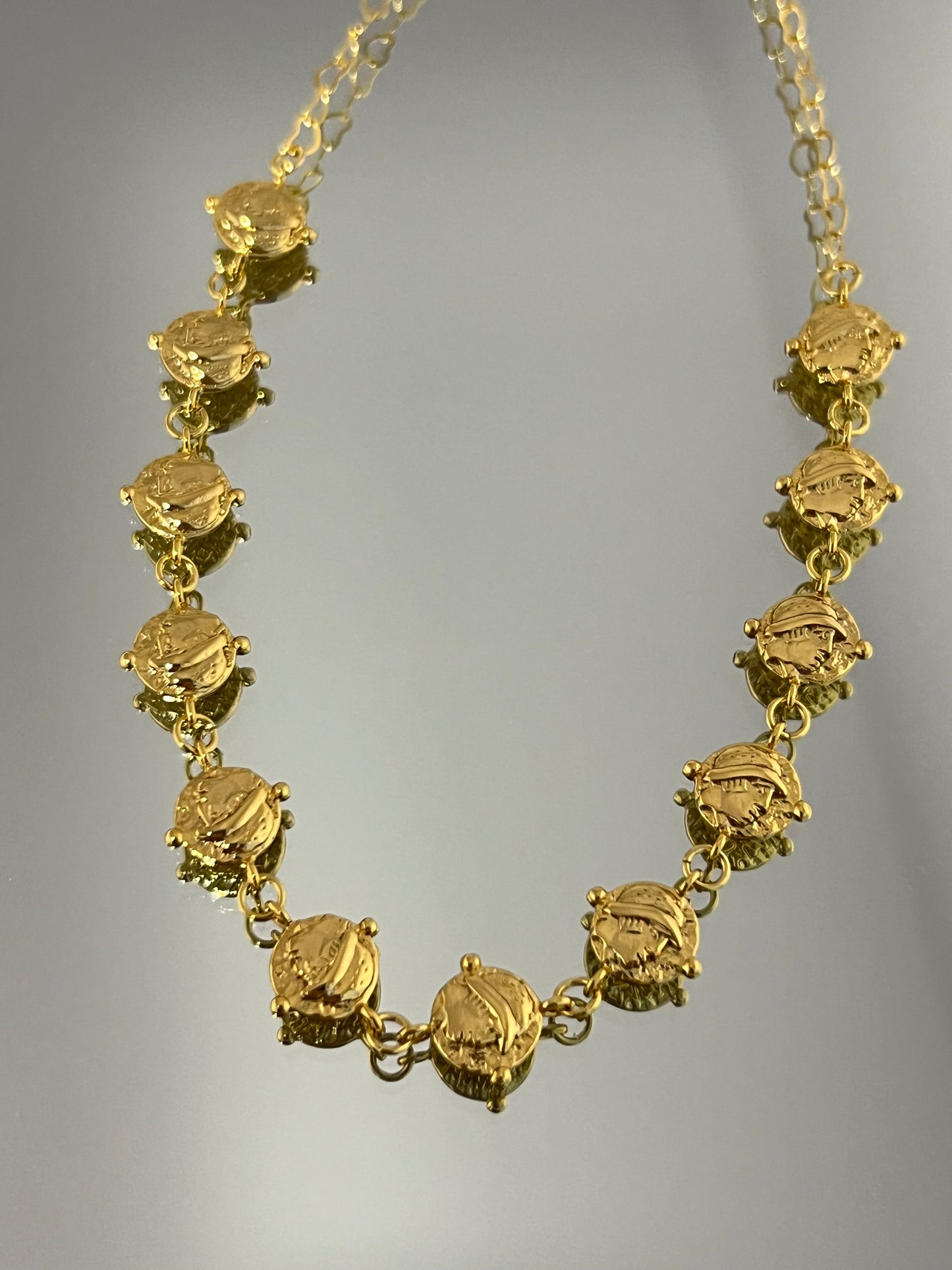 Echoes Of Wealth: Cascading Coin Necklace