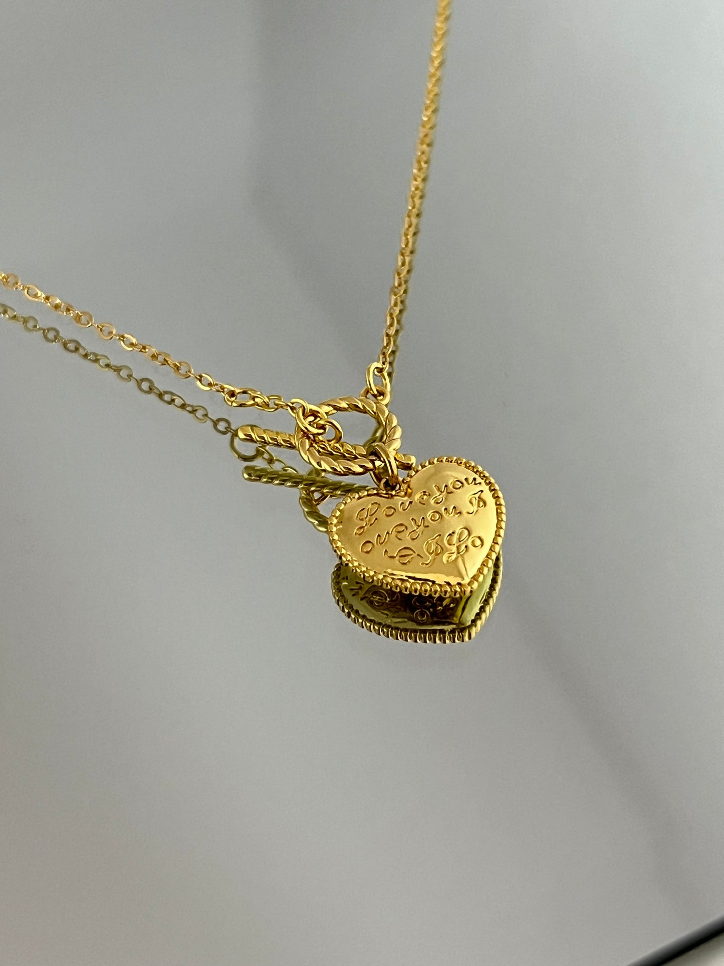 Golden Embrace: Gilded Heart Necklace