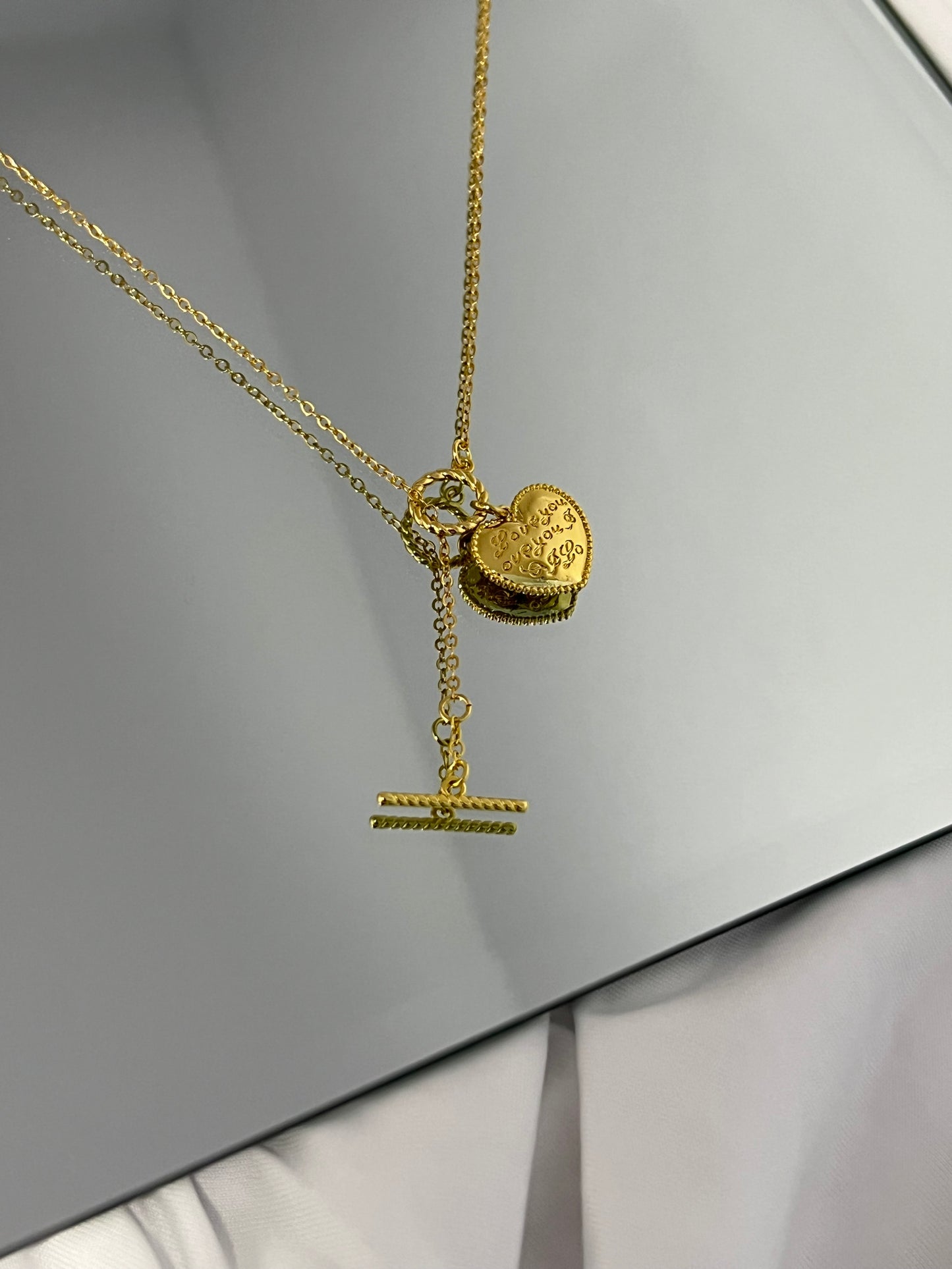 Golden Embrace: Gilded Heart Necklace