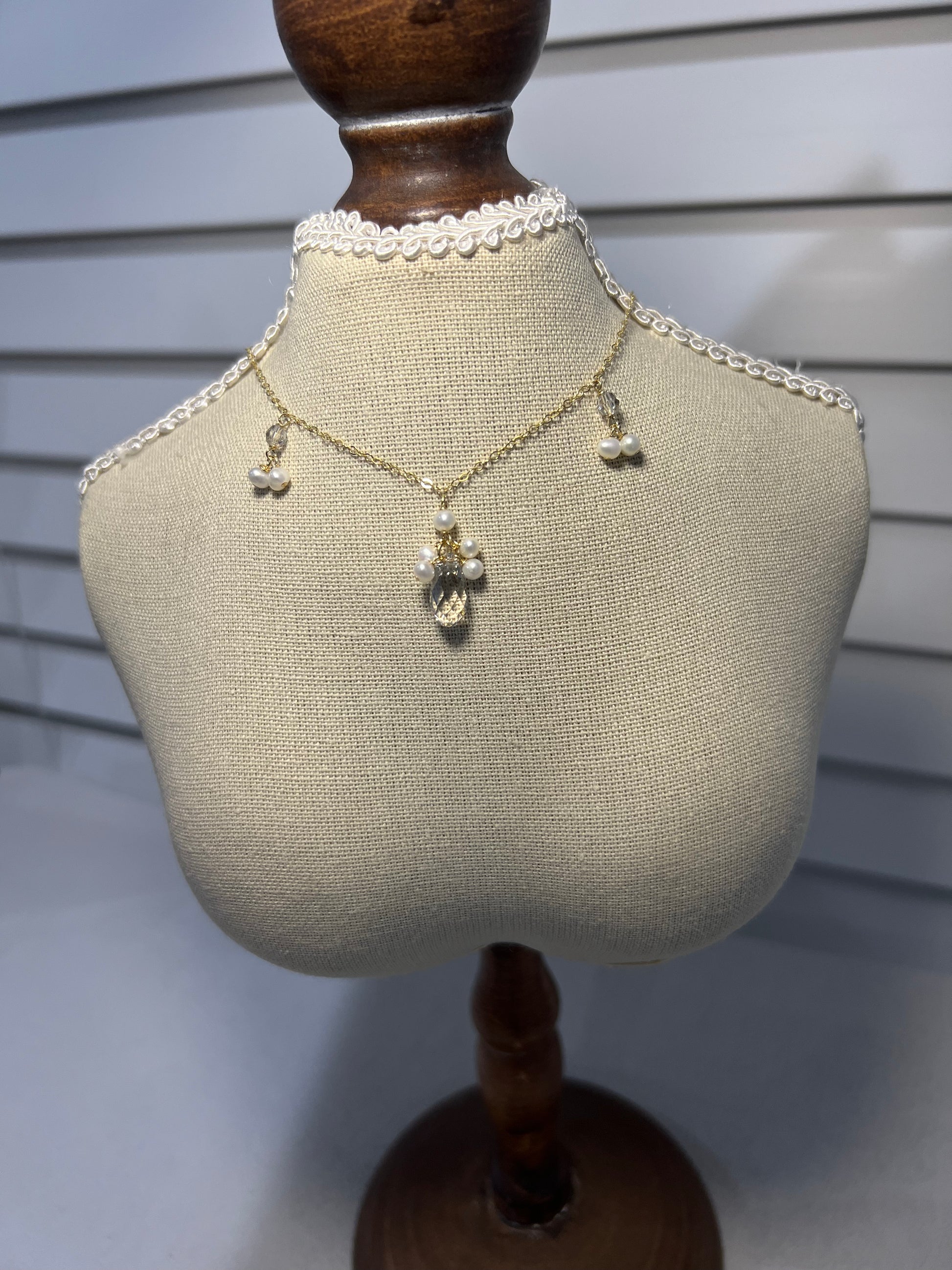 Swarovski crystal & pearls necklace on a small mannequin